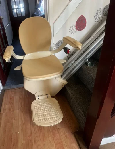 Stairlift fitted with hinge rail for slimline staircase in Bolton